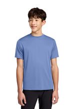 Carolina Blue Port & Co Youth Performance Tee. PC380Y
