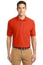 Front View of Orange Port Authority Silk Touch Polo K500