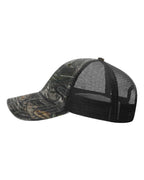 Left View of Mossy Oak Country DNA/ Black Garment Washed Printed Trucker Cap - 111P